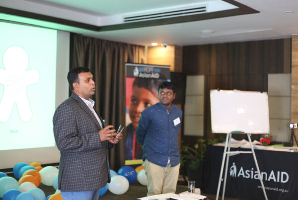 Man speaking to an audience